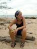 Colleen Sitting on a log