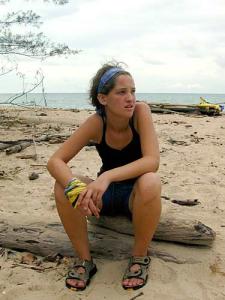 Colleen Sitting on a log